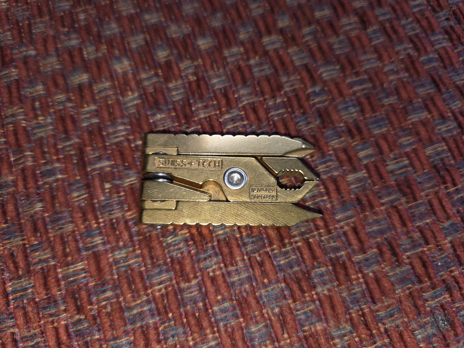 Swiss+Tech gold US patent #5491856 compact multi-tool