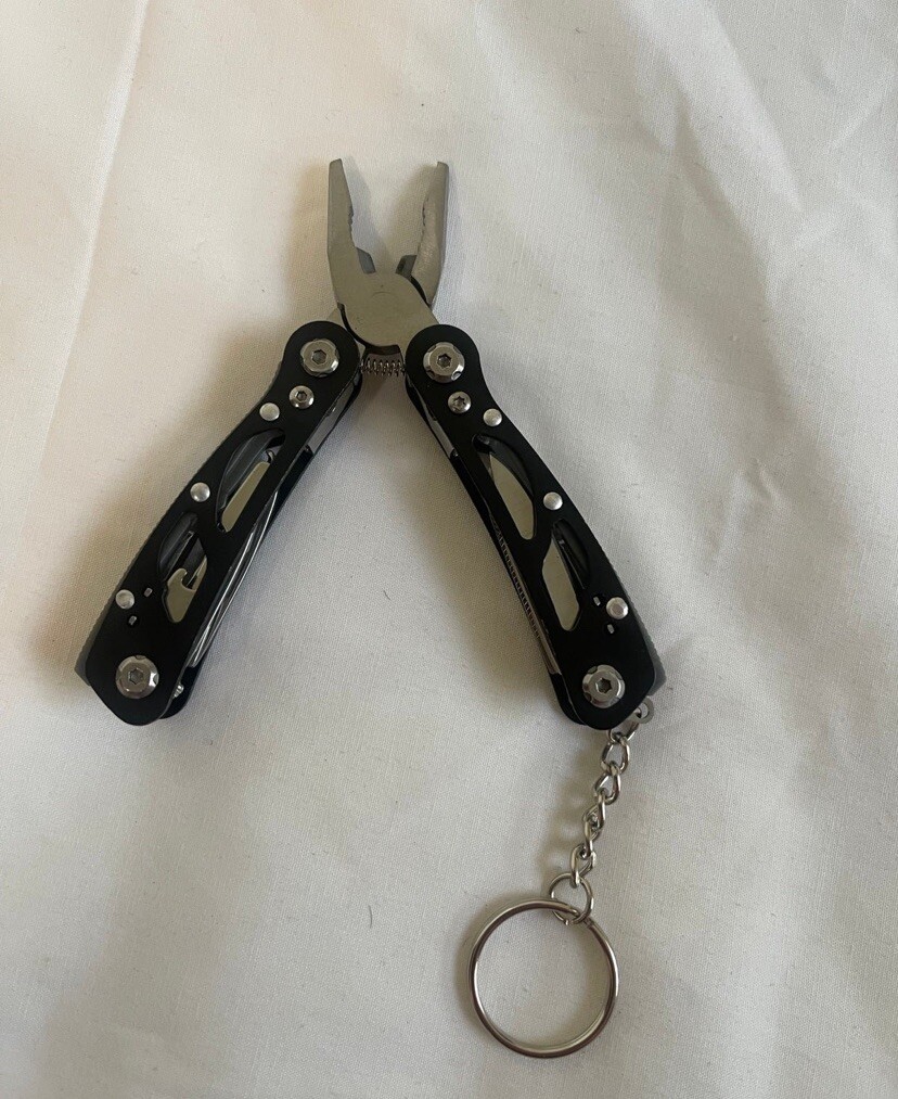 Pocket Size Multitool with Spring-Action Pliers and Saw,