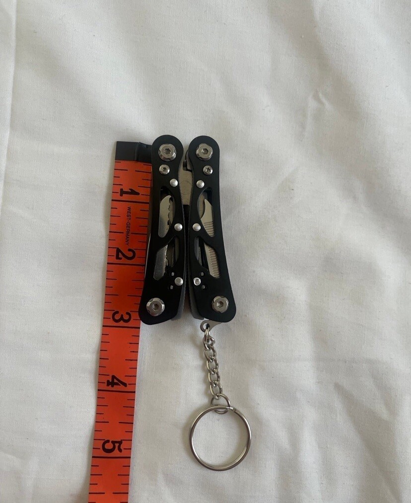 Pocket Size Multitool with Spring-Action Pliers and Saw,