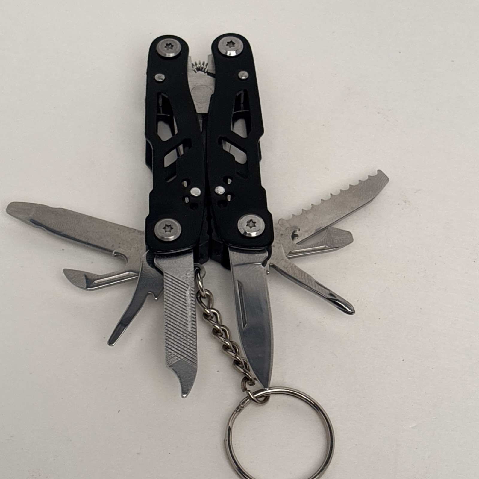 Lot Of 4 Different Function Multi-Tools Winchester Nail Clipper & Wood Grain