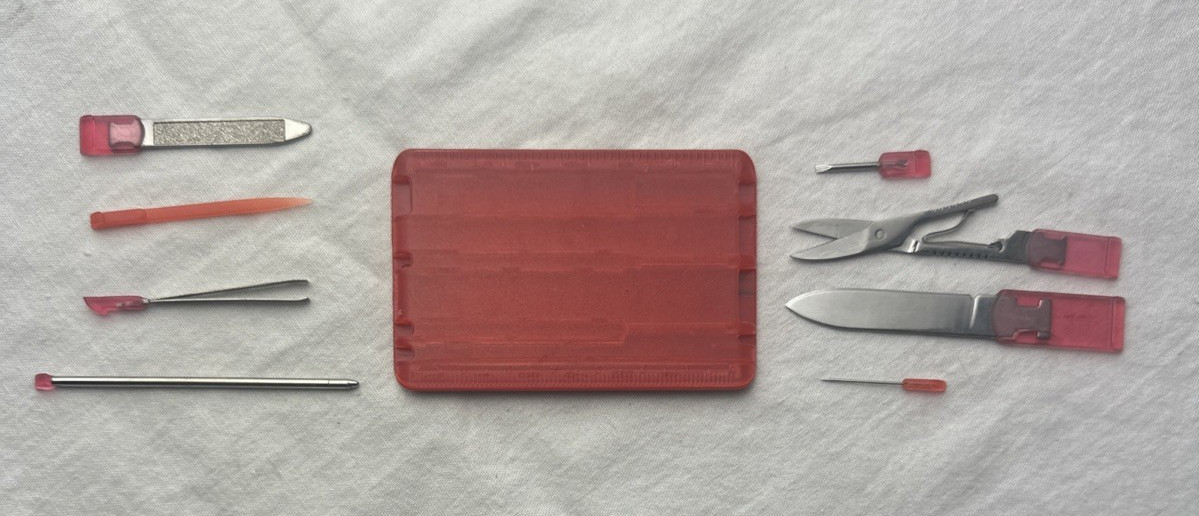Vintage Brookstone Credit Card Size Multi Tool Knife Scissors File Tweezers Red