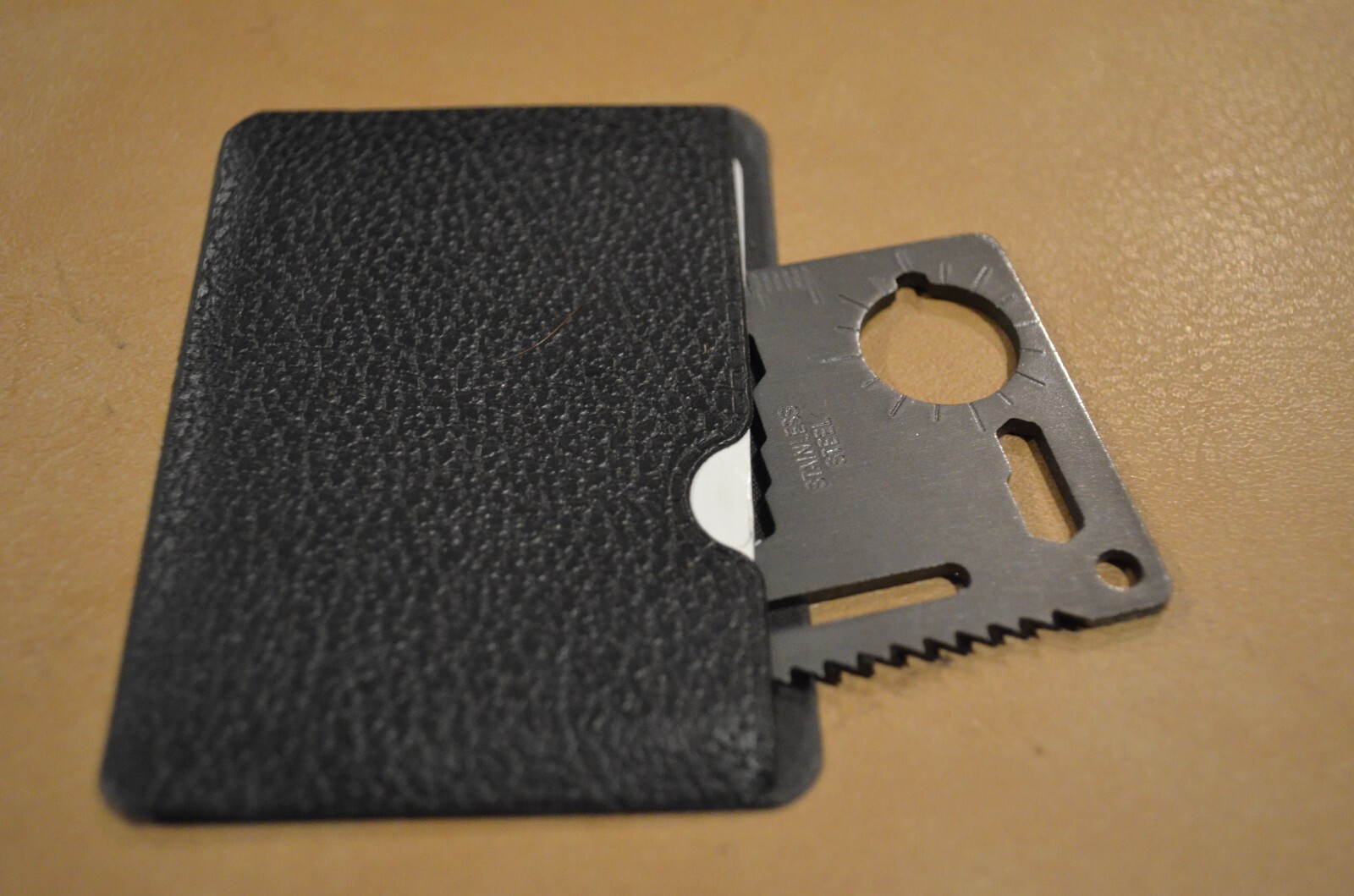 Smallish Wallet Size Multi Survival Tool in Gun Metal Color in Black case Metal