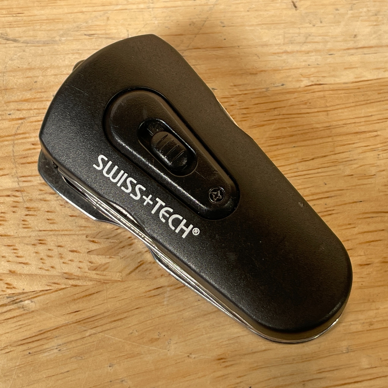 Swiss+Tech Black Stainless Steel 8-in-1 LED Flashlight Bottle Opener Swivel Tool