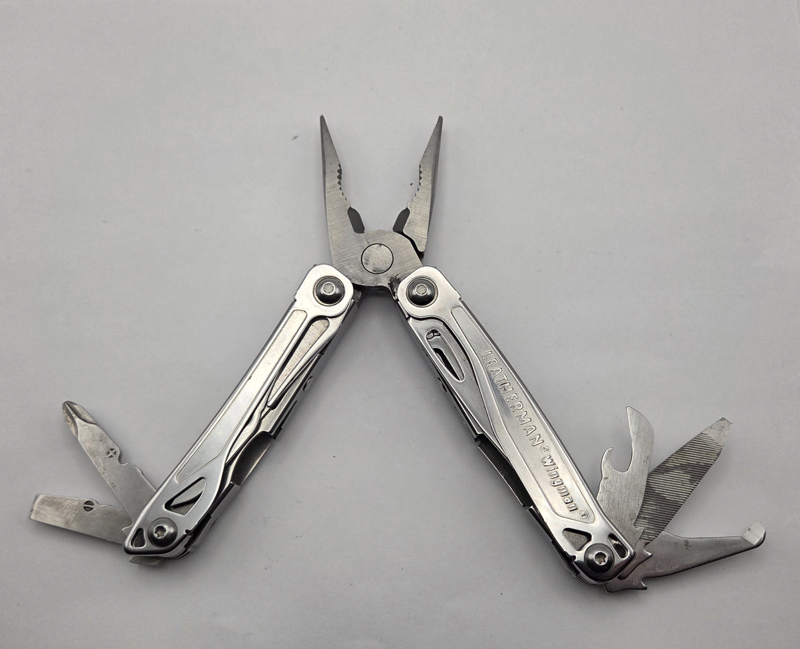 Leatherman Wingman Multi Tool Stainless Steel Made in USA Silver w moneyClip L10