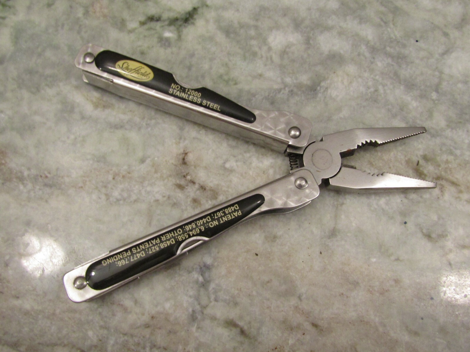 SHEFFIELD MODEL 12000 STAINLESS STEEL FOLDING MULTI-TOOL