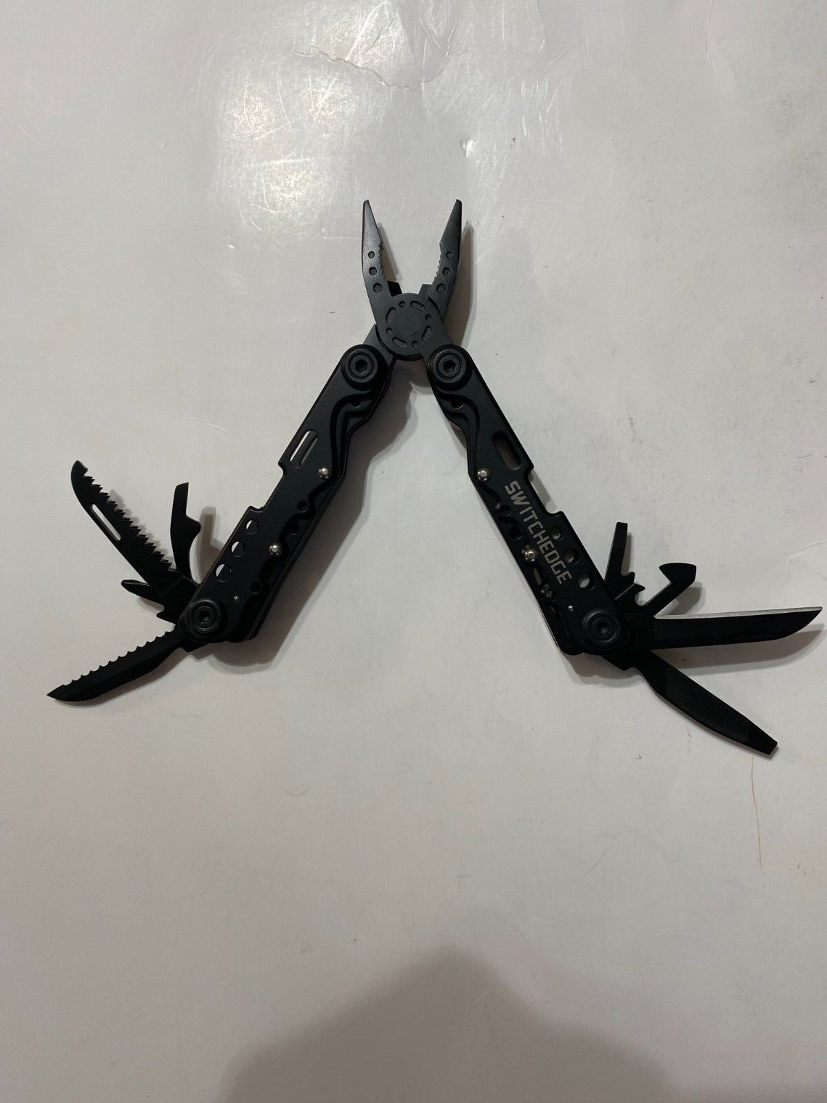 NEW SWITCHEDGE 14 in 1 MULTI TOOL WITH CARRYING POUCH.