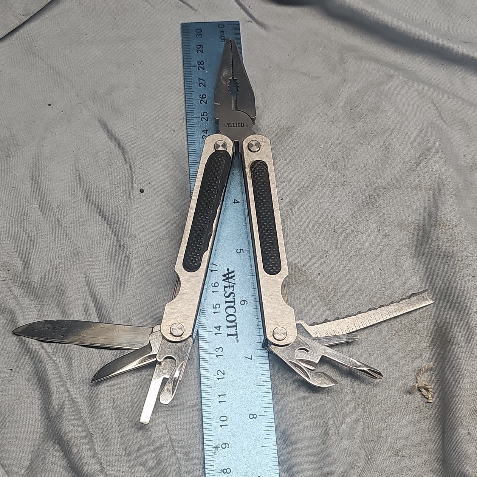 ALLIED Stainless Steel Multi-Tool Pliers 7 Tools: Knife, Saw, Ruler Silver/Black