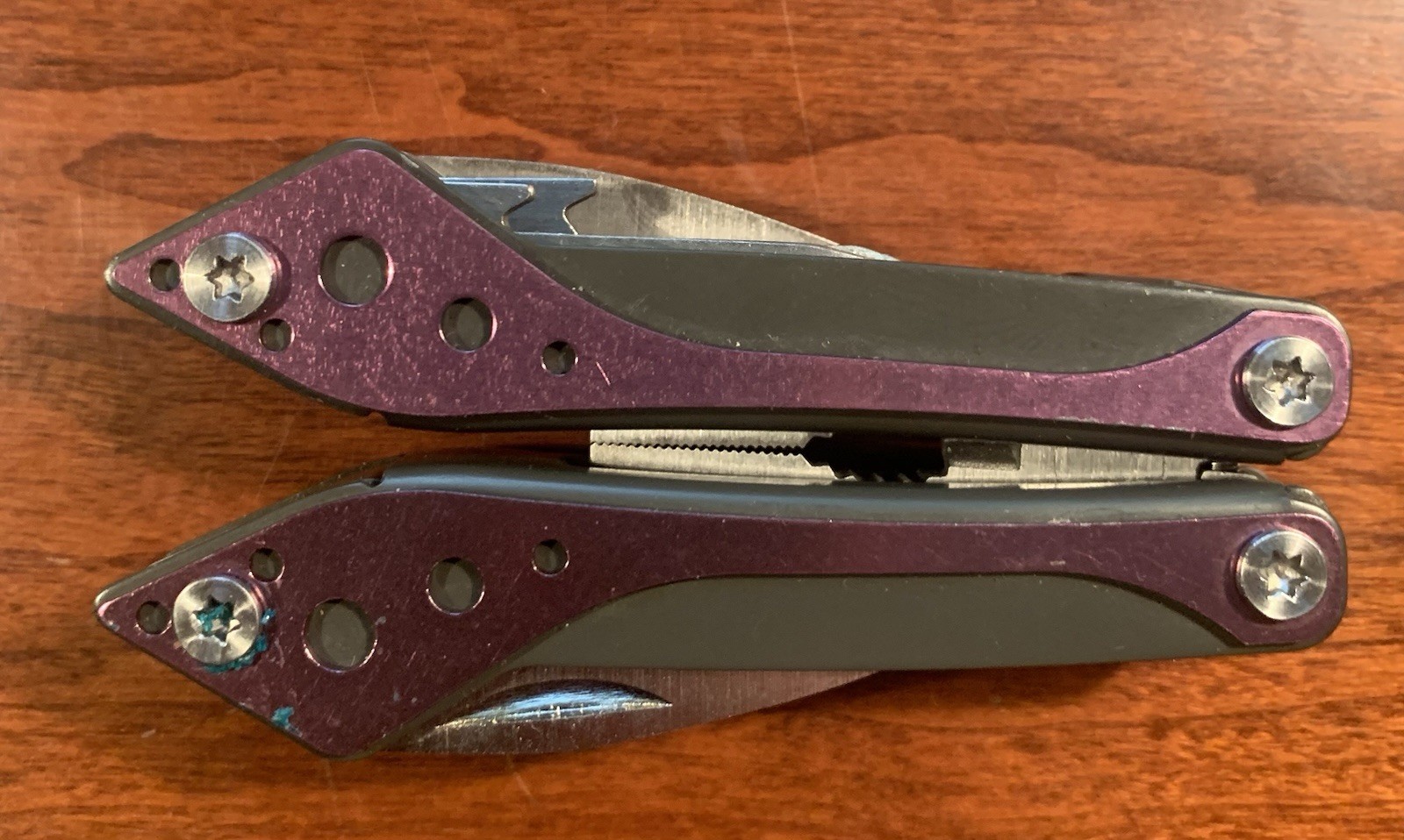 Cabela’s 8-Tool Multi-Tool with Spring Open Pliers, Scissors, Saw Purple