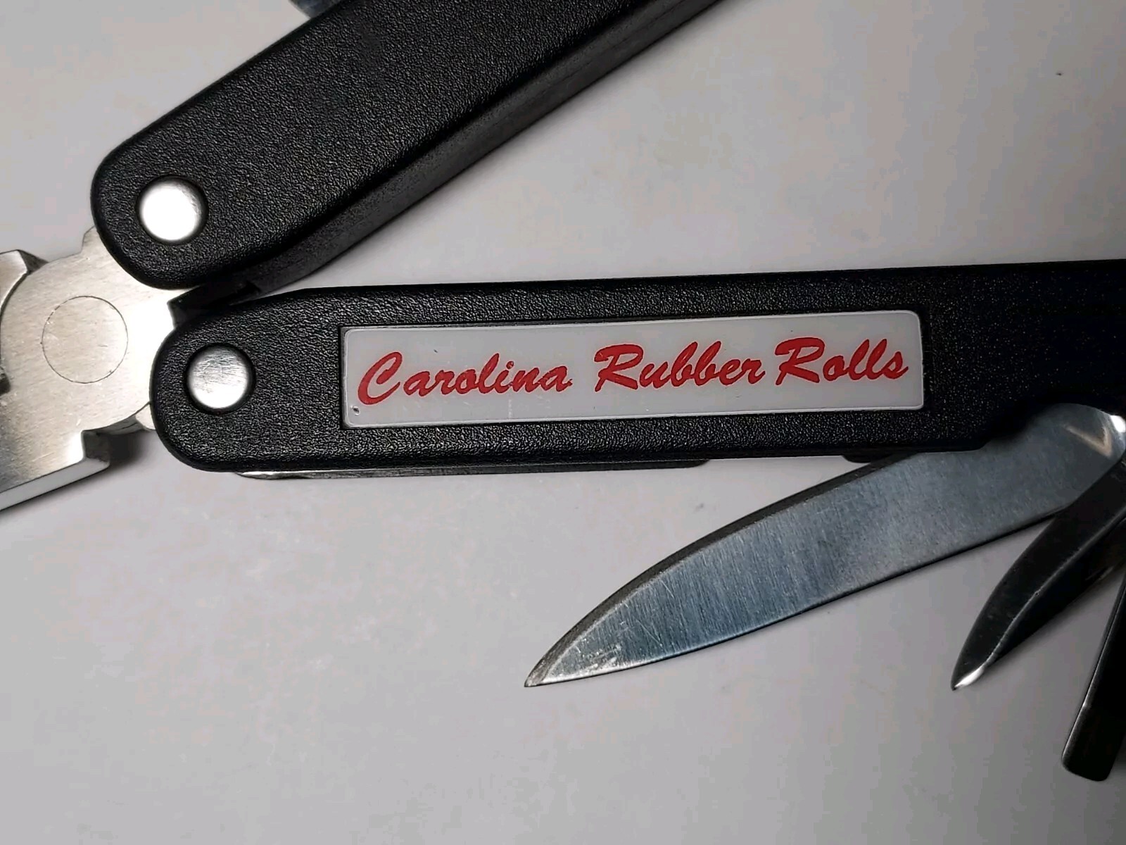 Pliers Multi Tool advertising Carolina Rubber Rolls with nylon pouch
