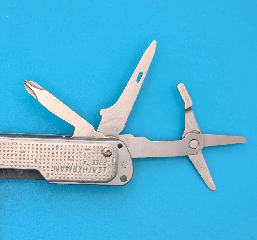 Leatherman FREE T4 Pocket Knife Multi-tool! Stainless! RETIRED!