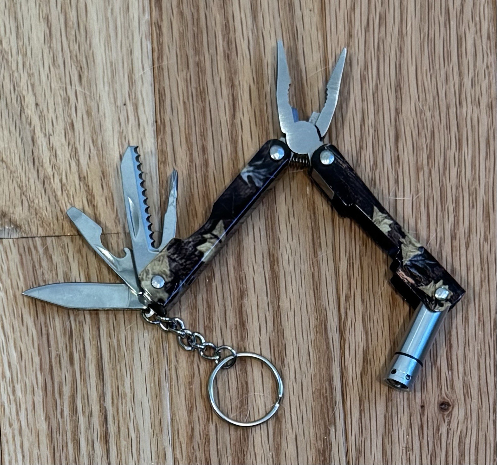 Camouflage Multi-Tool Flashlight Knife Pliers Key Chain Screwdriver Bottle Opene