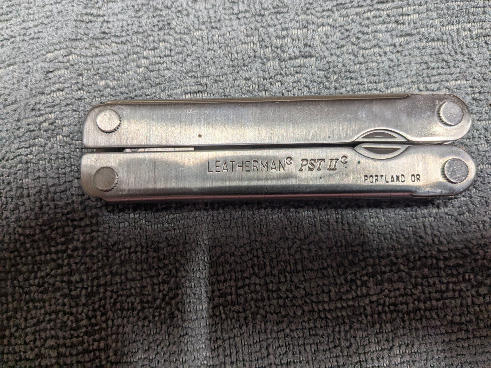 LEATHERMAN PSTii MULTI TOOL with Lightly Handled SHEATH (04/02 date Code)