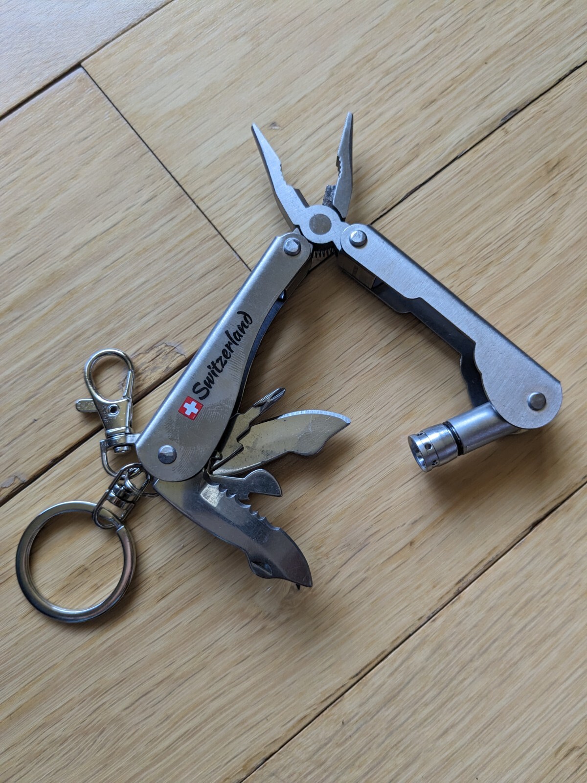 Swiss-Made Foldable Pocket Multi-Tool Stainless Steel w Pocket Clip. 8 Functions
