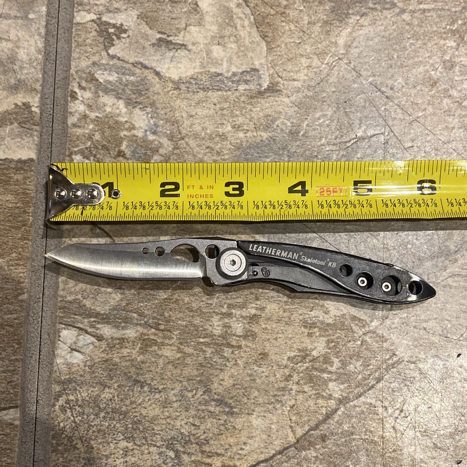 Nice! Leatherman Skeletool KB Folding Knife USA Black Handles With Bottle Opener