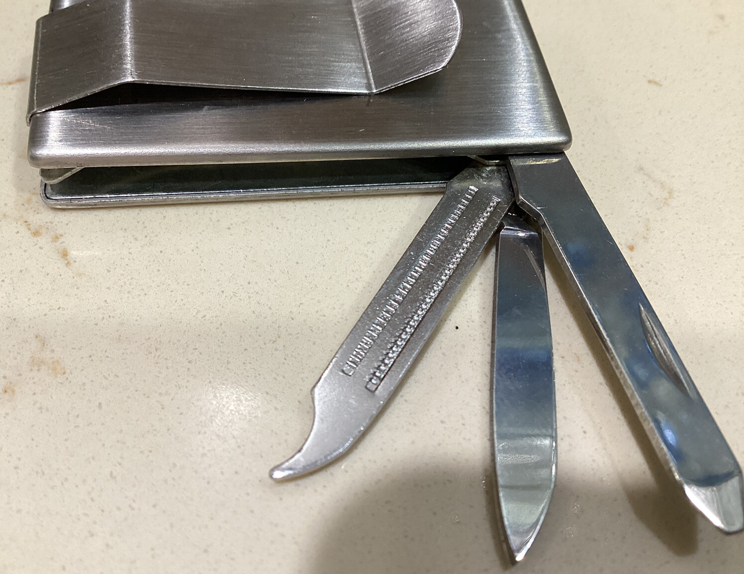 Belt Clip Tiny 5 Tool Mult-Tool (promotional give-away) Knife, Scissors Etc.