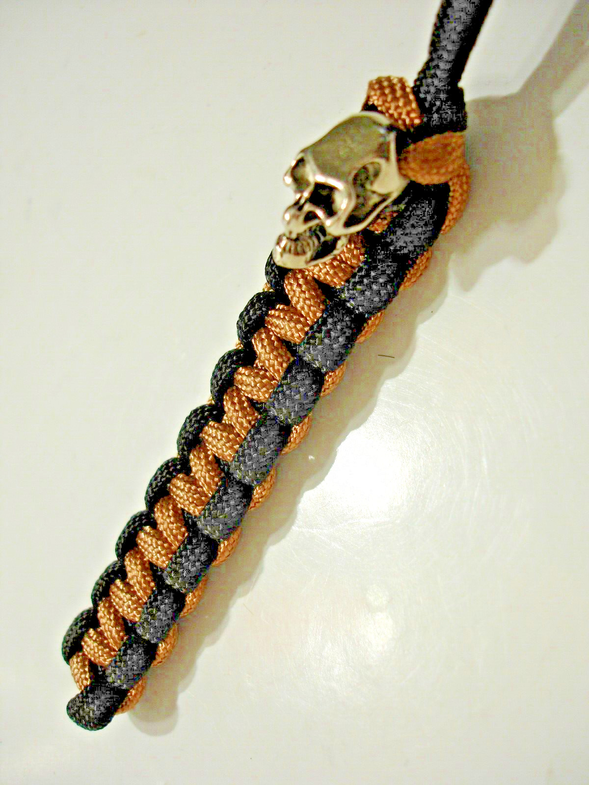 BLACK & GOLD 550 PARACORD HANDMADE KNIFE LANYARD + METAL SKULL BEAD MADE IN USA