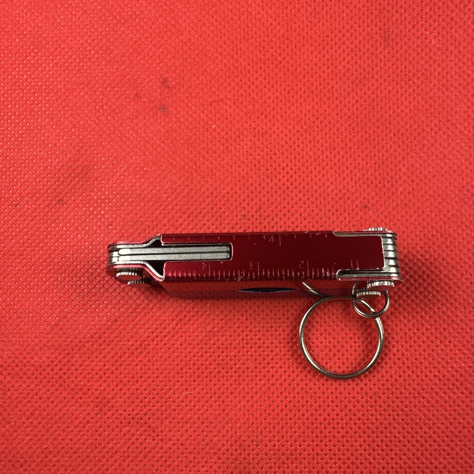 Red Blue Leatherman Micra Multi-Tool, scissor, knife, tweezer, screwdriver, EDC