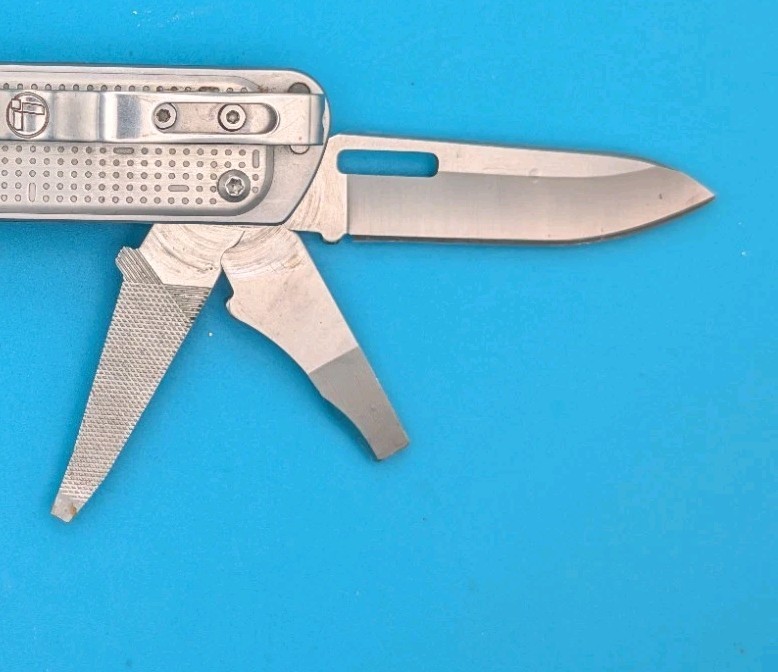 Leatherman FREE T4 Pocket Knife Multi-tool! Stainless! RETIRED!