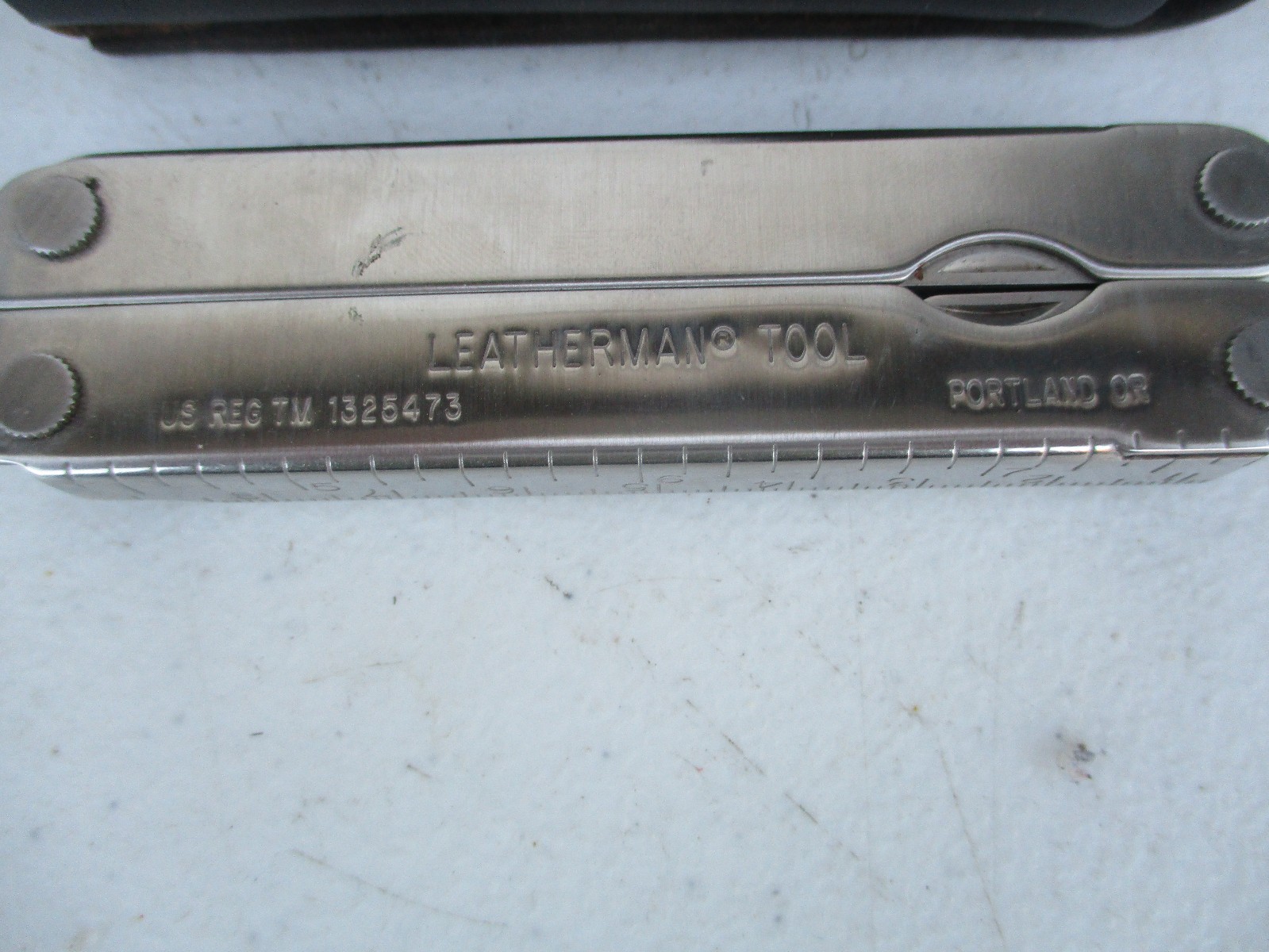 Leatherman Pocket Survival Tool USA Patent 1325473 w/ Leather Sheath Date 11/95