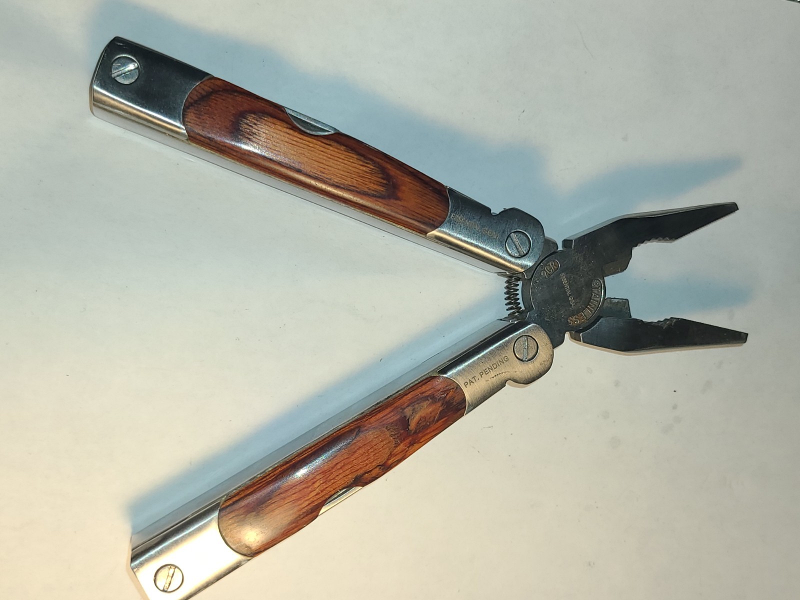 Similar to Leatherman Multi-Tool Sheffield 2CR Wood Grain Handle 12 in 1 minty!