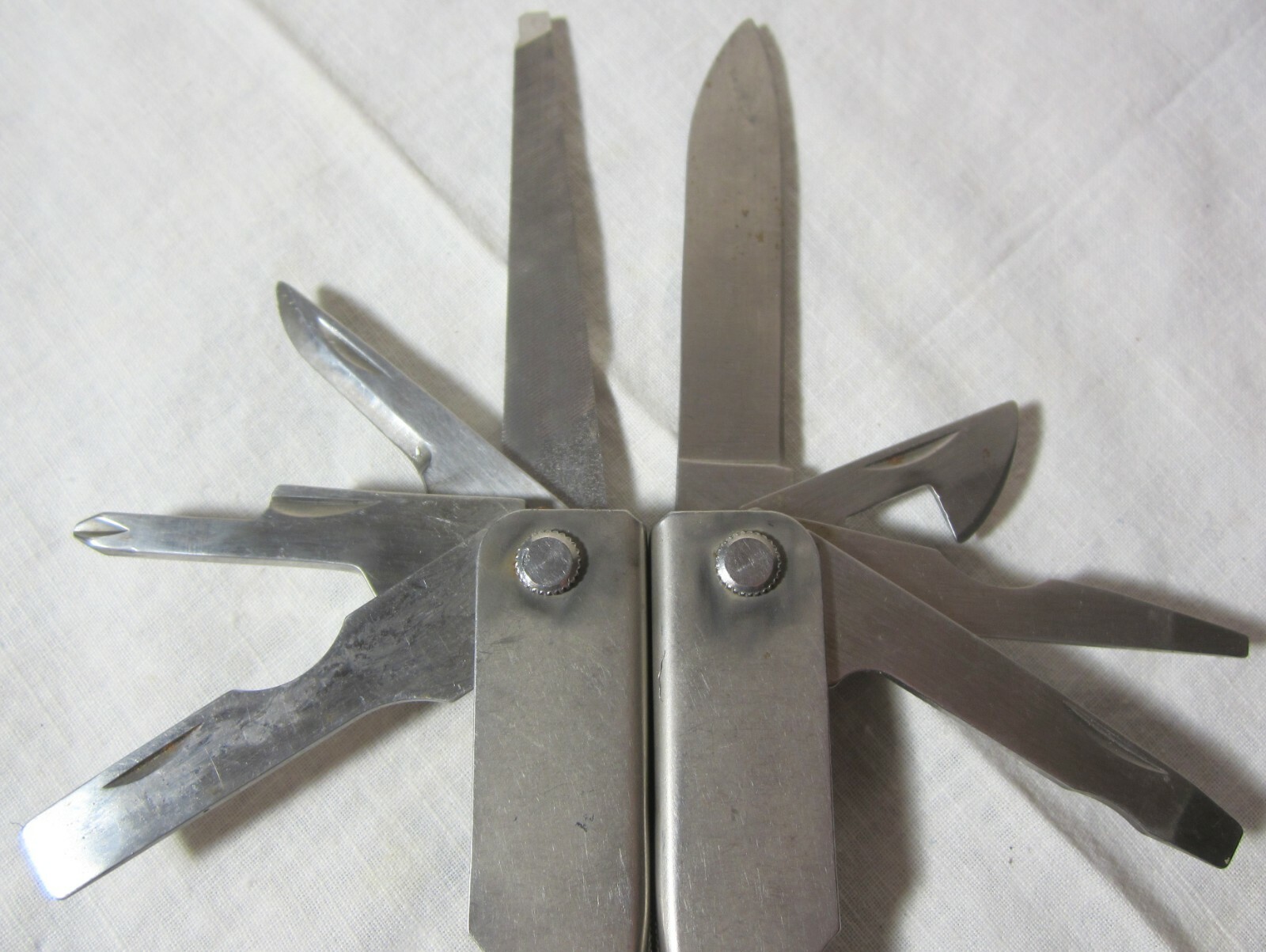 Kangli Multi-tool Pliers Knife Screwdriver Nail File Scissors Awl Saw Stainless