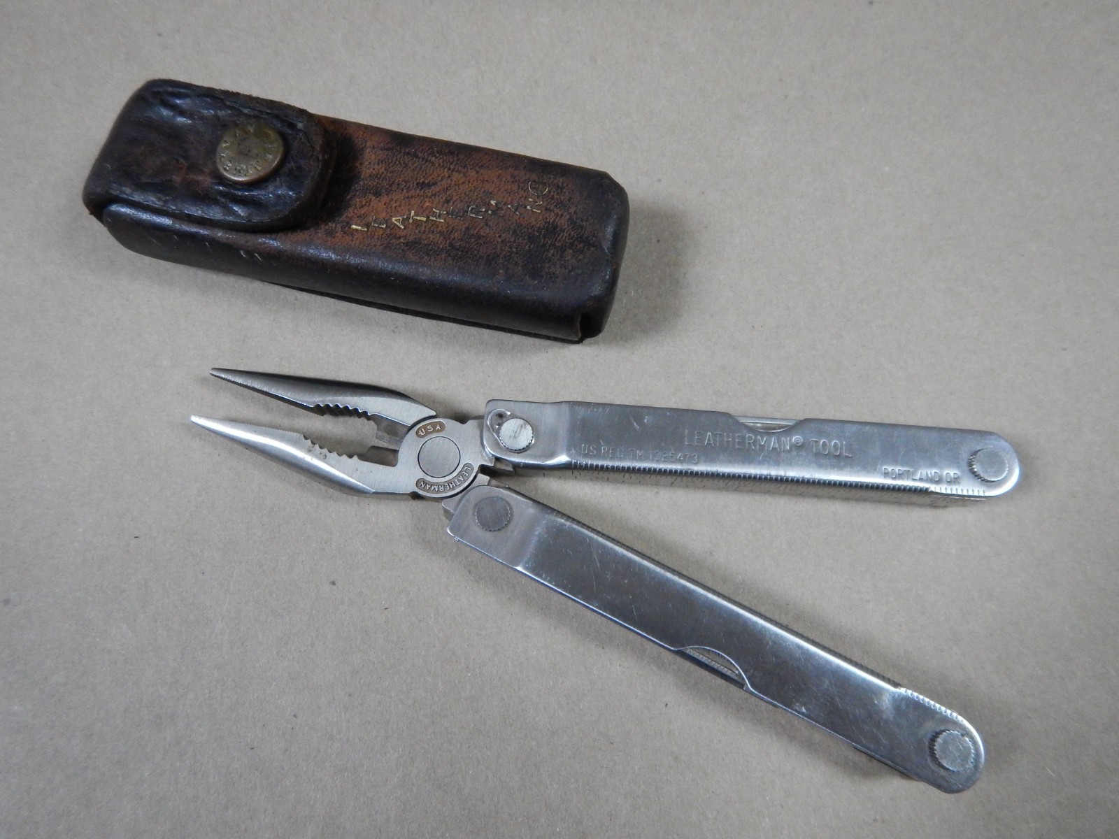 Original Leatherman Tool From The 90s with original leather sheath