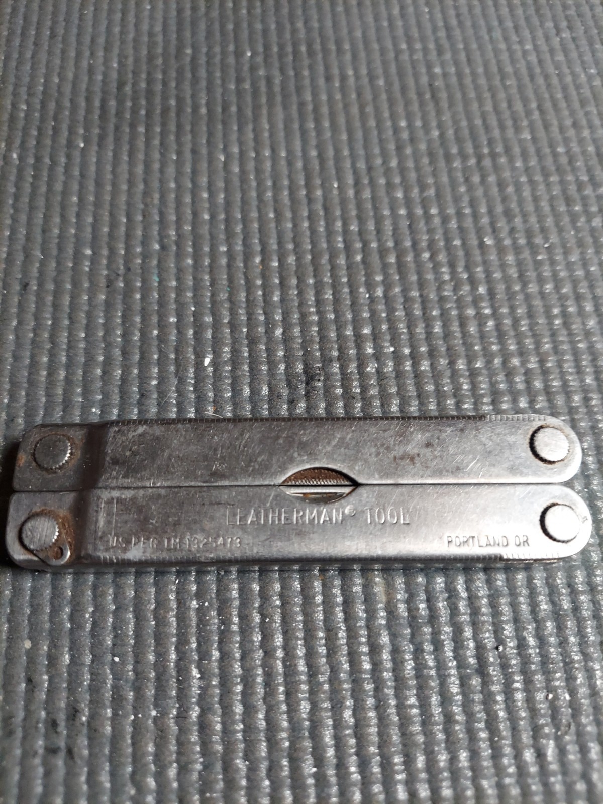 Original vintage Leatherman multi-tool, U.S. registered trademark (TM 1325473).