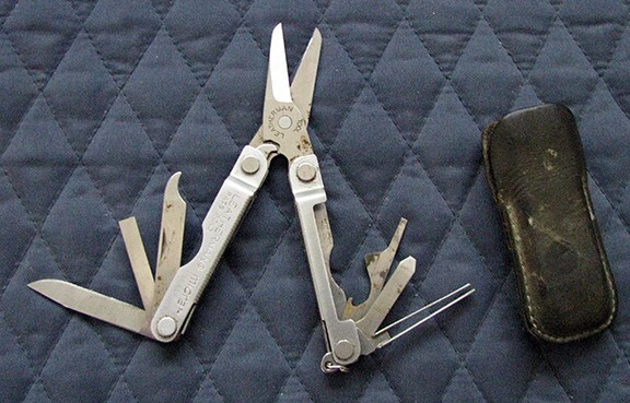 Letherman Multi mini Tool with case.