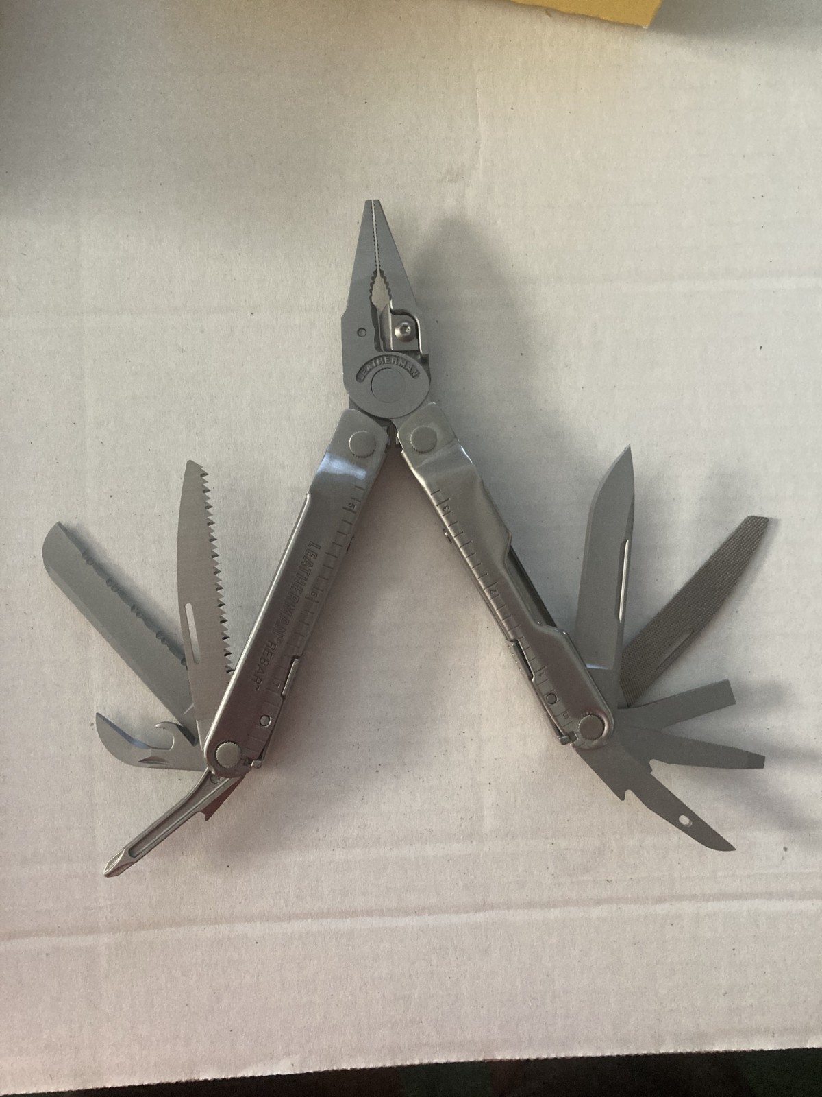 Leatherman Rebar 17 SS Tool, Multi-tool in Stainless Color 831547 with case.