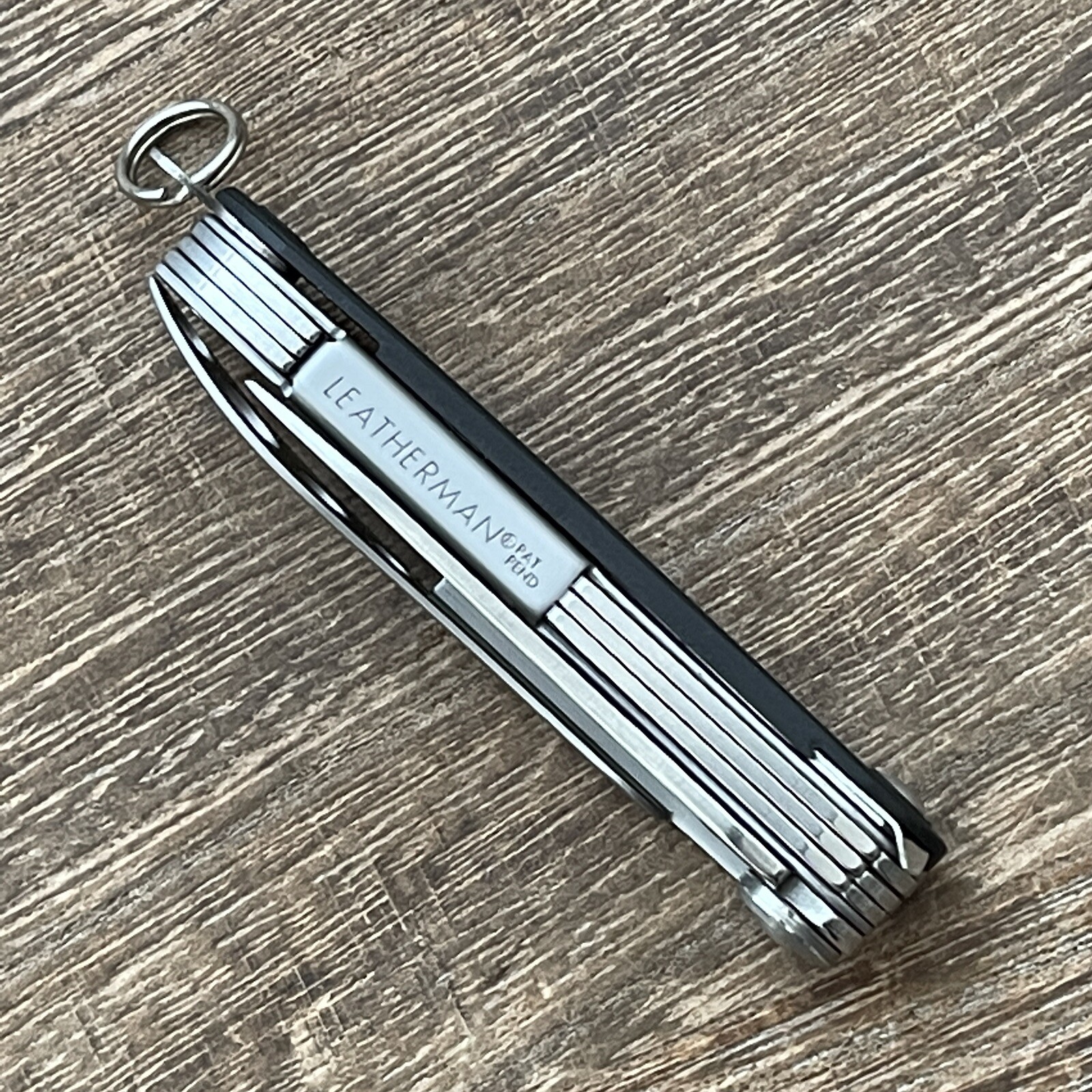 Leatherman Style Black multitool. New. Discontinued. Branded “Dell”.