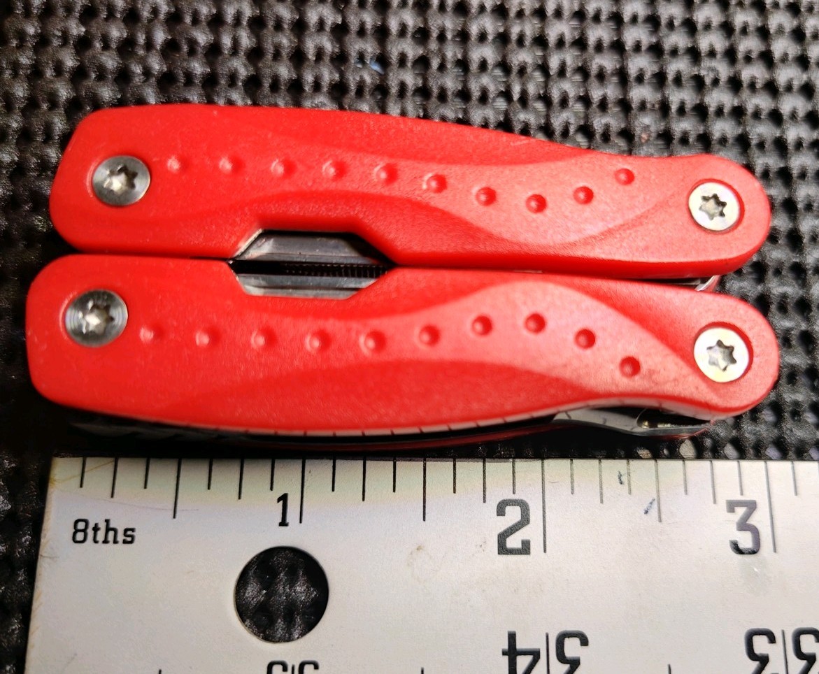 Small Multi tool With Needle Point Spring Plyers Red Used