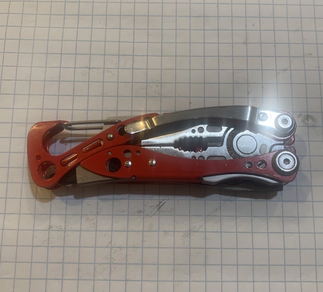 Leatherman Skeletool RX Multi Tool Red 154CM Serrated Rescue Glass Breaker Bit