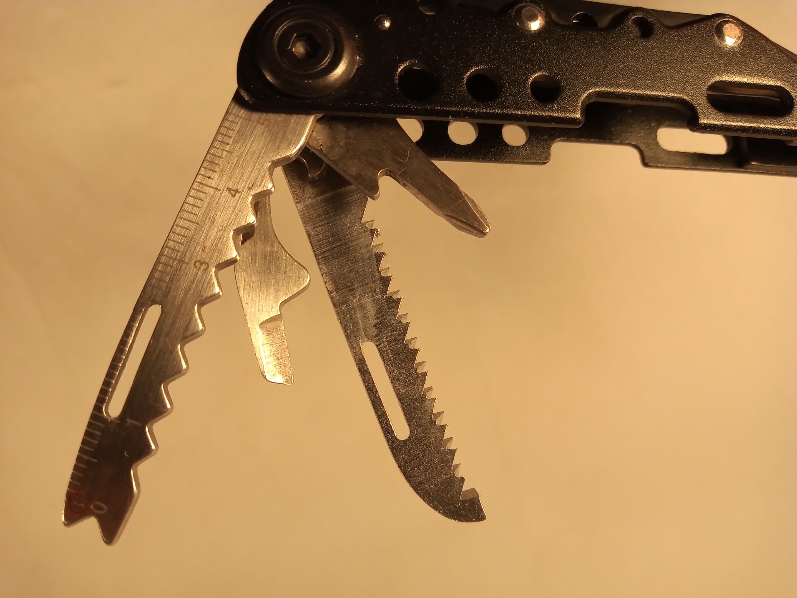 14-In-1 Multi-Tool Pliers Knives Screwdrivers Opener Fish Scaler Saw File Ruler
