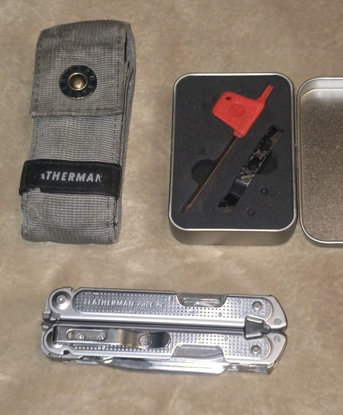 Retired Leatherman Free P4 Multi-Tool With Sheath and Donk Titanium Pocket Clip