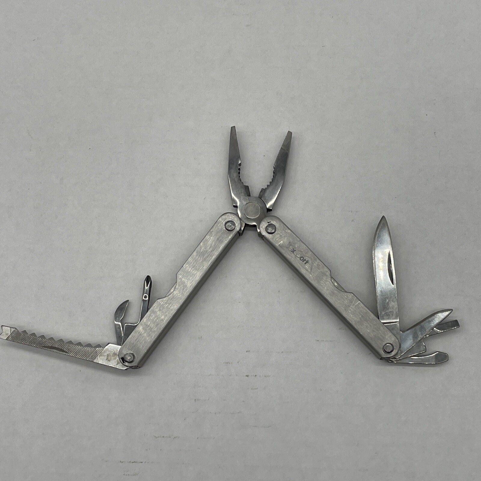 Texsport Multi Functional Folding Tool With Brown Holder