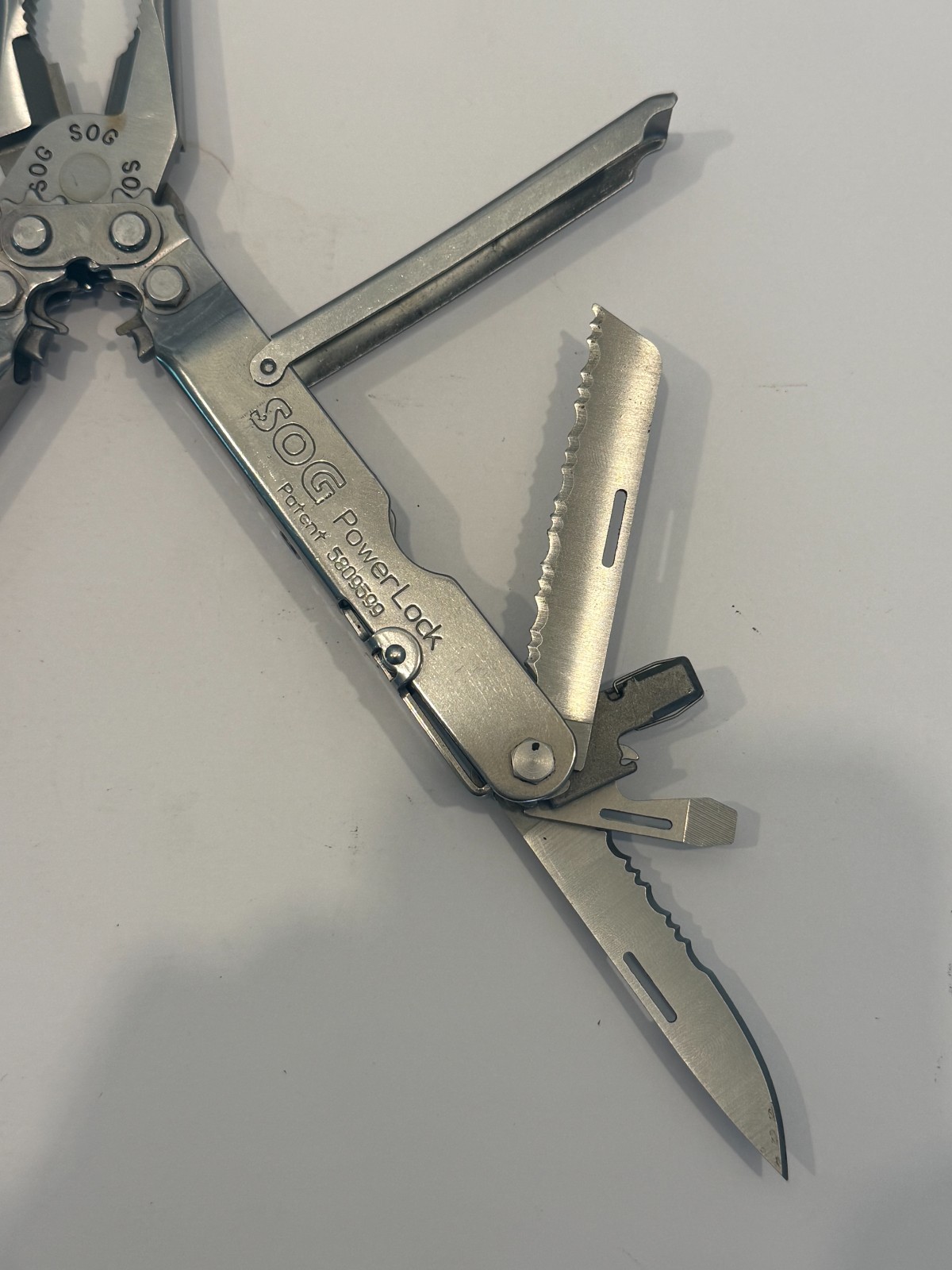 SOG PowerLock Stainless Multi-Tool Patent 5809599 w/ Leather Sheath