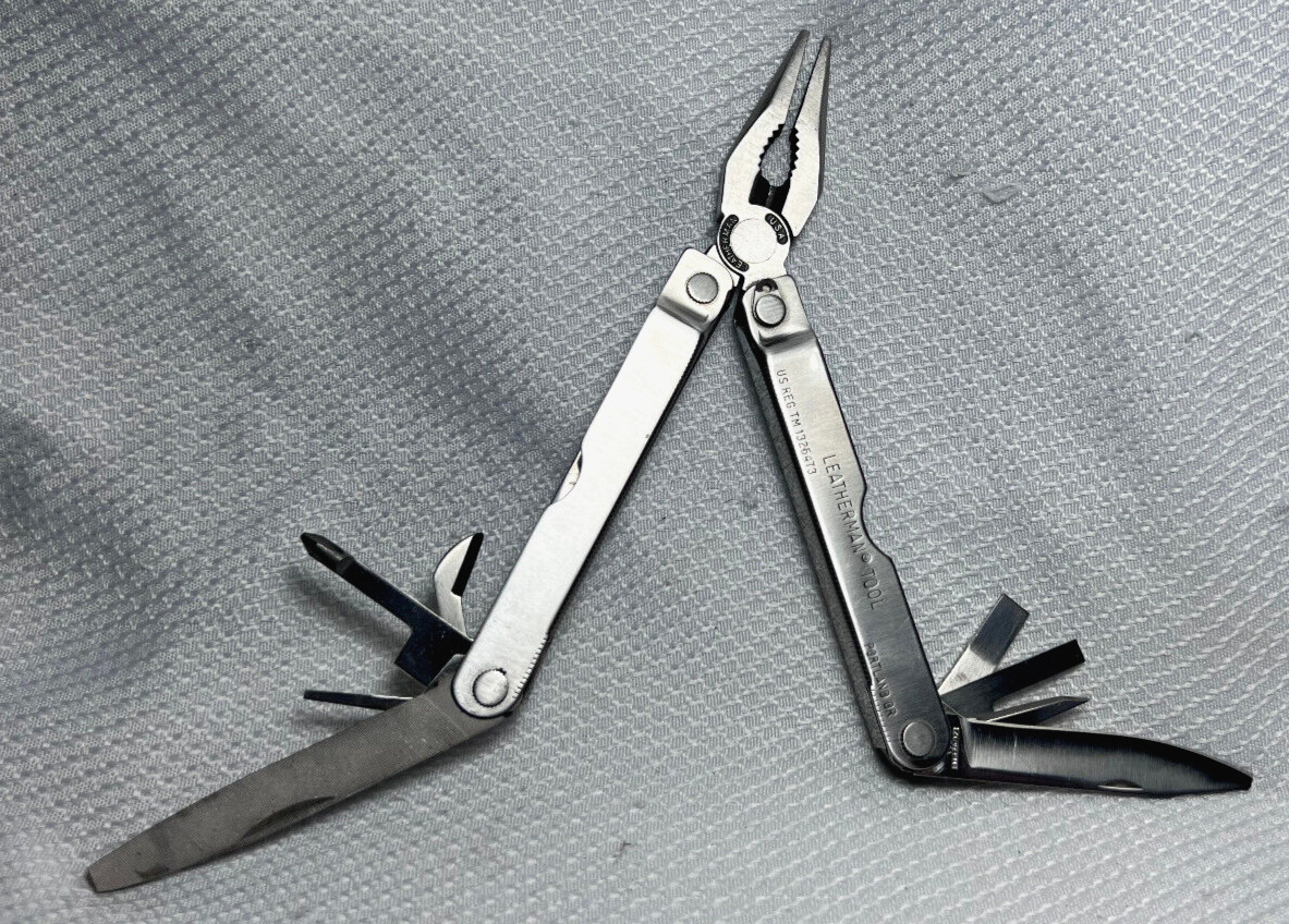 Leatherman Pocket Survival Tool Portland, OR USA With Sheath And User Guide
