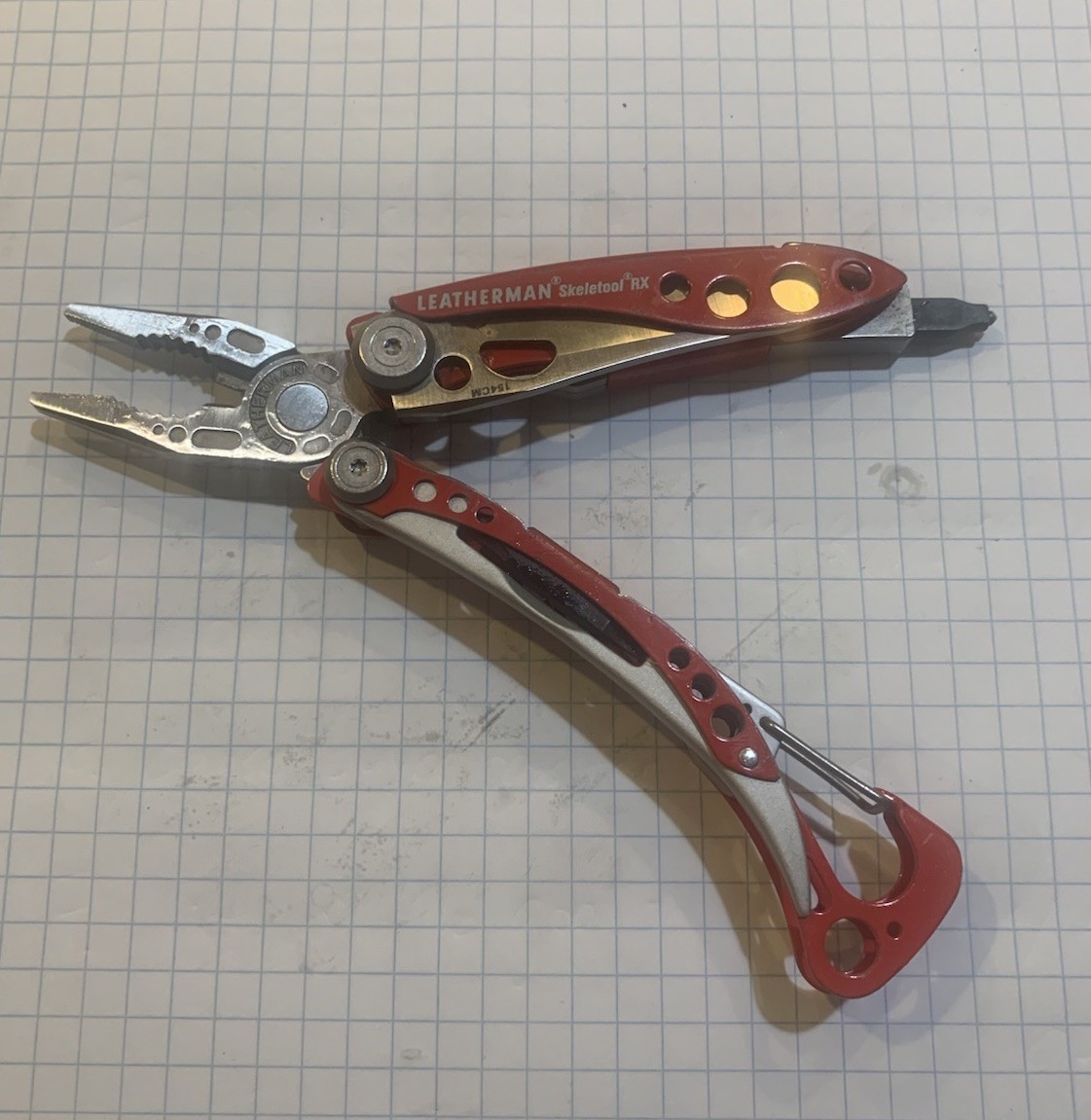 Leatherman Skeletool RX Multi Tool Red 154CM Serrated Rescue Glass Breaker Bit