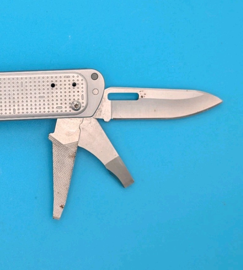 Leatherman FREE T4 Pocket Knife Multi-tool! Stainless! RETIRED!