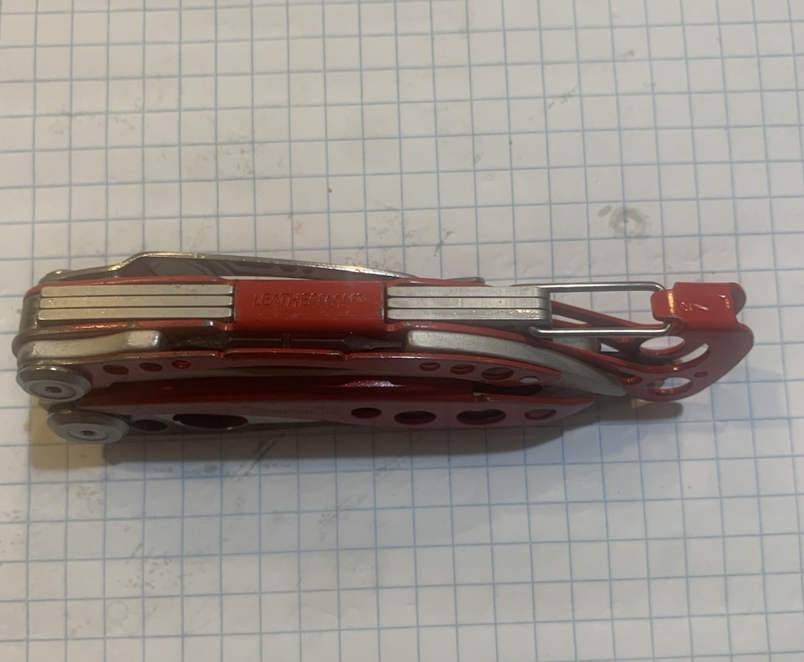 Leatherman Skeletool RX Multi Tool Red 154CM Serrated Rescue Glass Breaker Bit