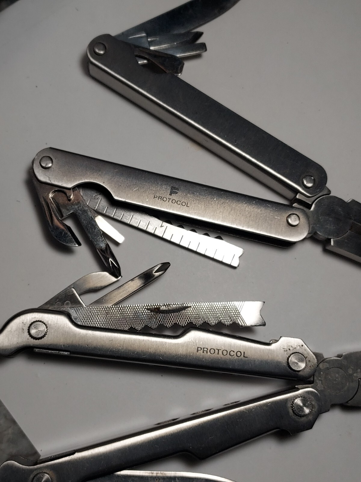 2 Protocol Multi Tools – Pliers, Blade, Screwdrivers