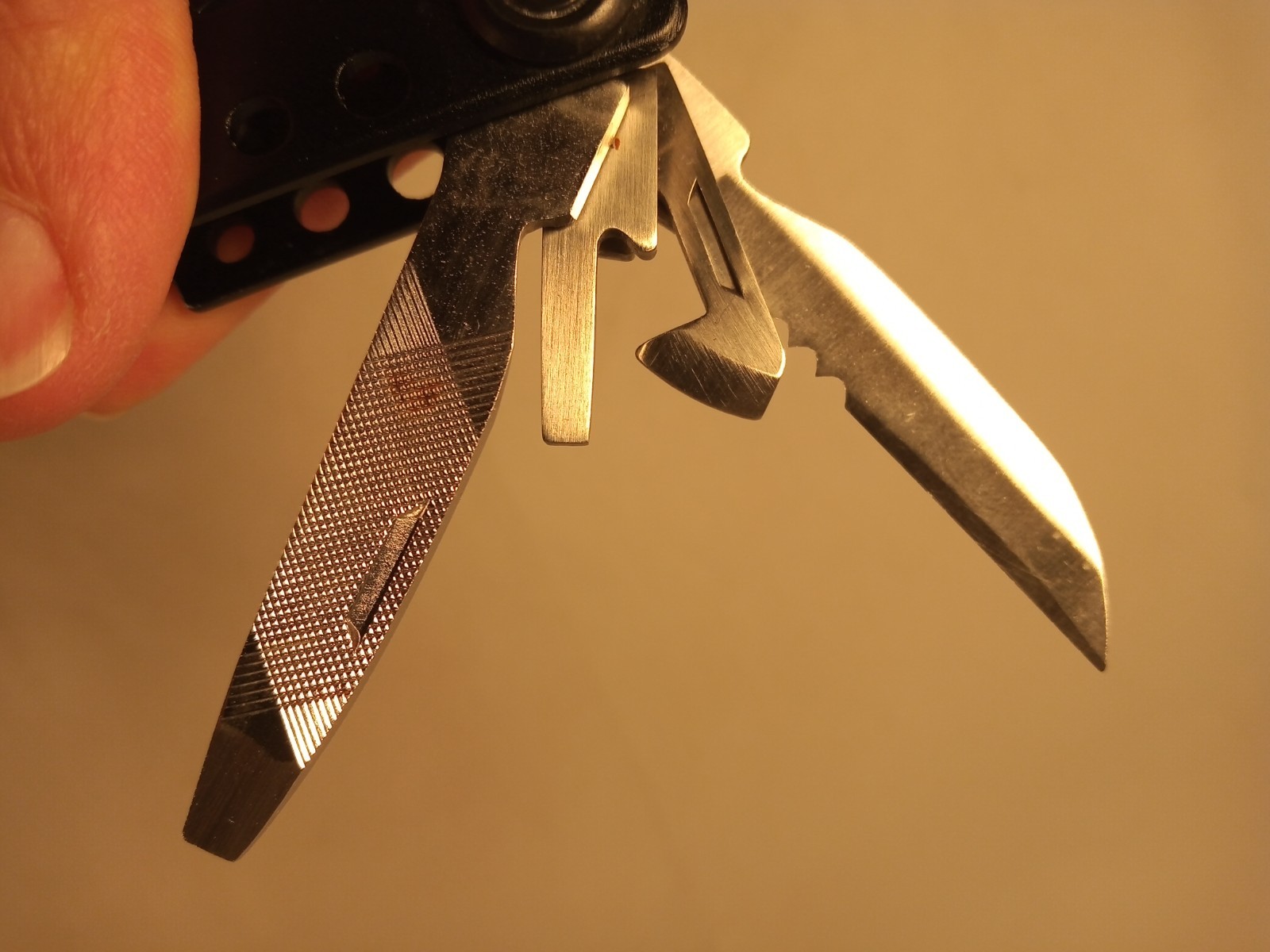 14-In-1 Multi-Tool Pliers Knives Screwdrivers Opener Fish Scaler Saw File Ruler