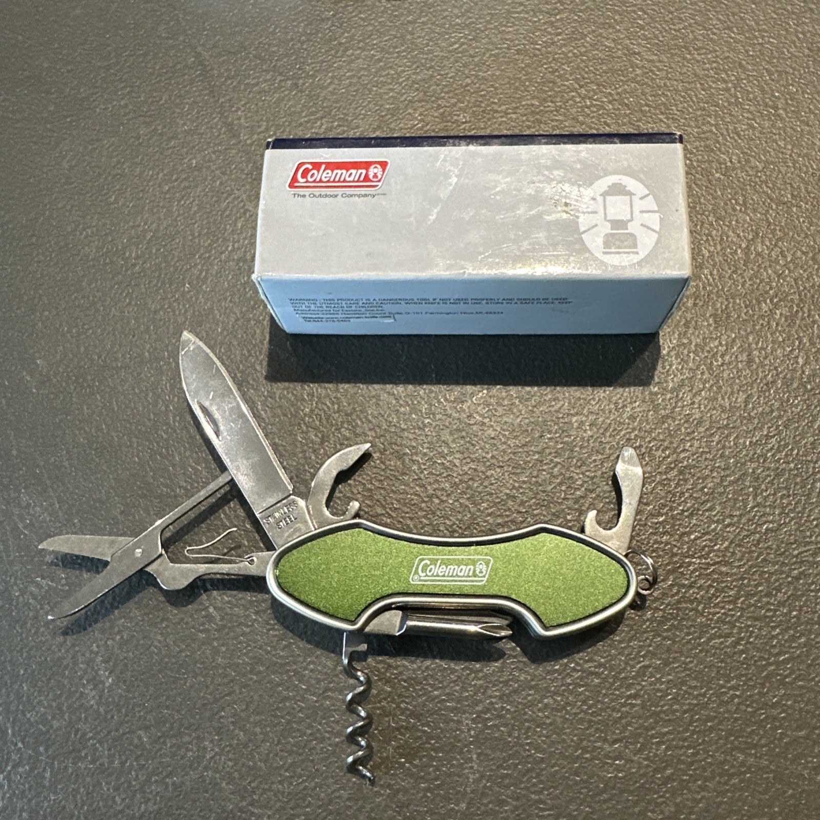 Amazing 3 and 1/2″ Coleman Multi Function Knife NOS, 7 Tools In It!!