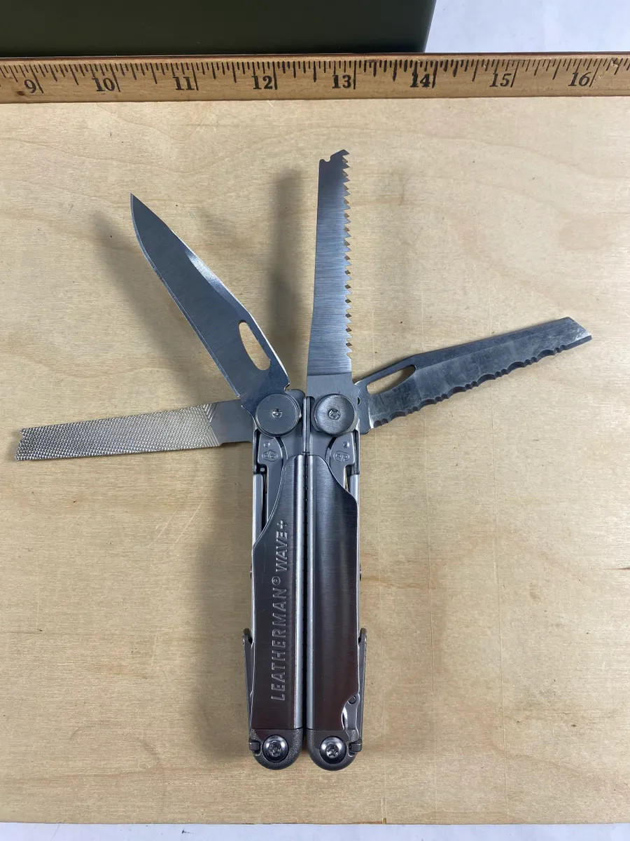 Leatherman Wave Plus W+2. Most tools looks/feel brand new. (MSRP $129.95 NEW)