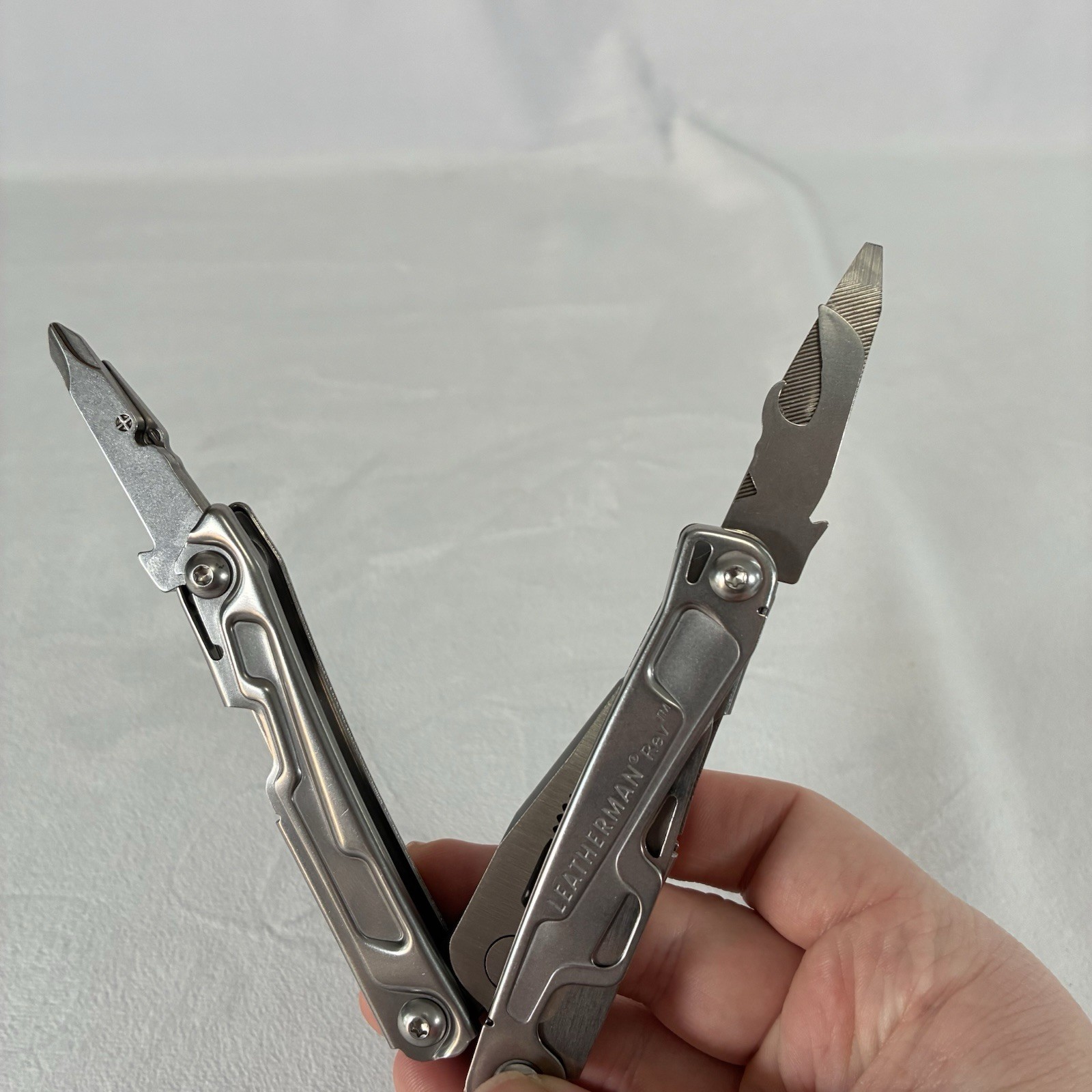 Leatherman Rev Stainless Steel 14-Tool Multi-Tool Pocket Knife w/ Pocket Clip