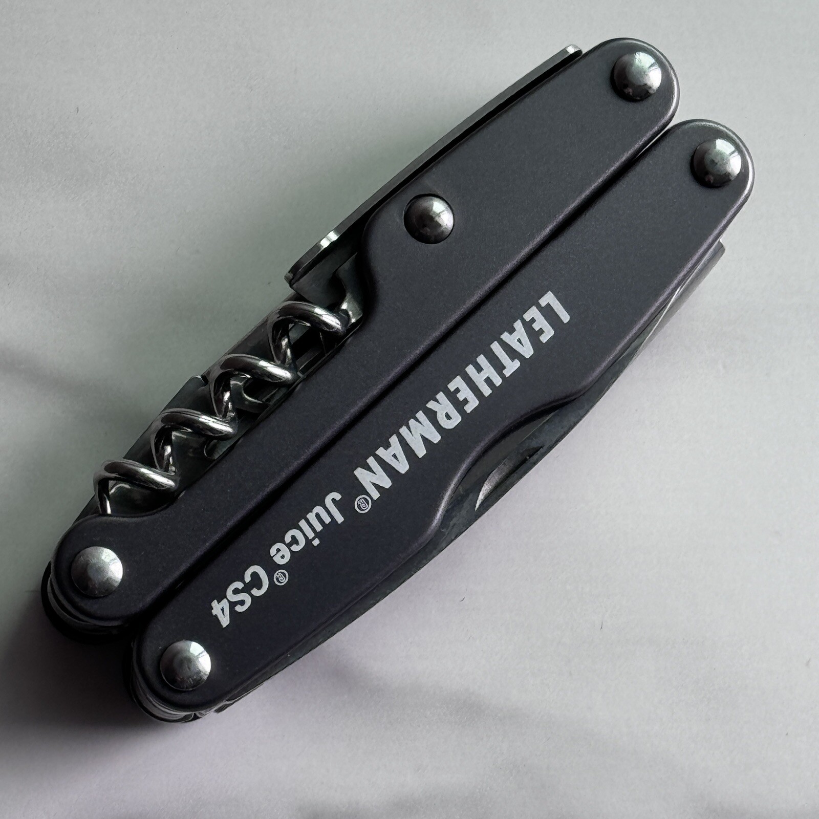 New, Early Leatherman Juice CS4 Storm Gray multitool.