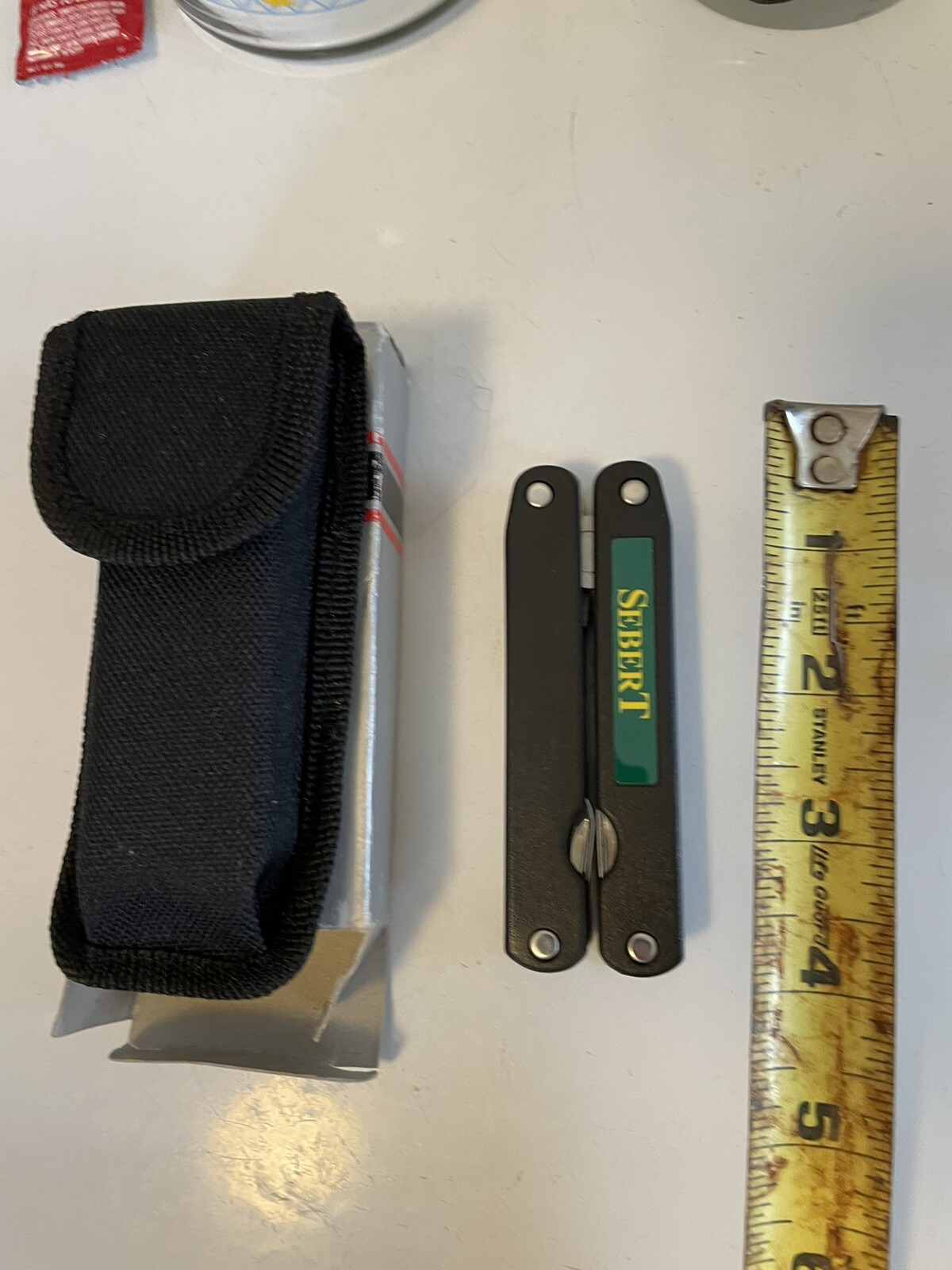 Barlow multi tool. New In Box With Pouch. Sebert Landscaping Logo.
