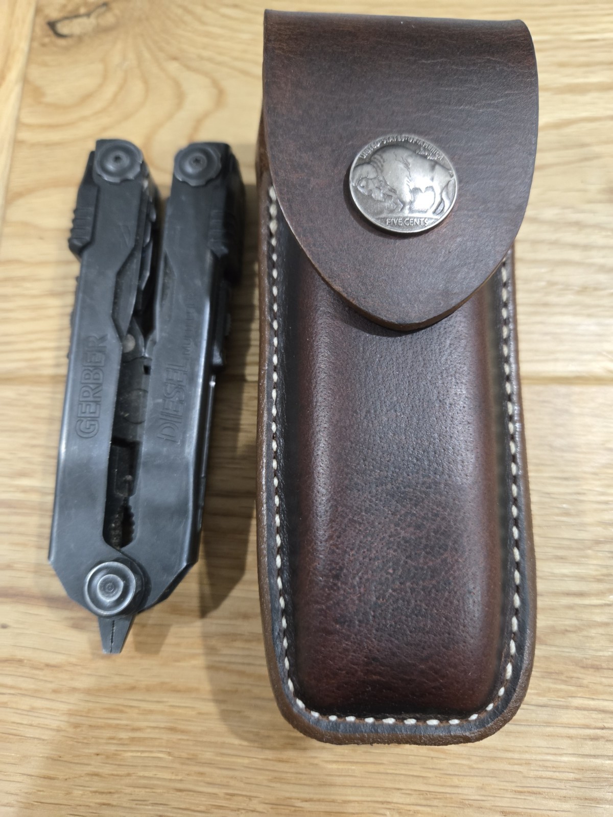 Gerber MP600 or Diesel multi tool leather sheath. Belt Clip. Sheath only.