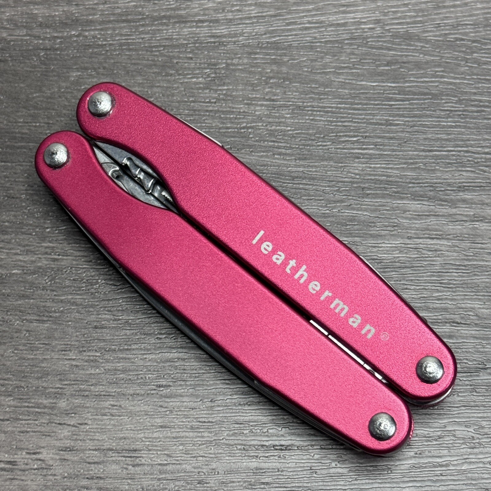 TWO Leatherman Juice C2 Red multitools. TM variants. Discontinued