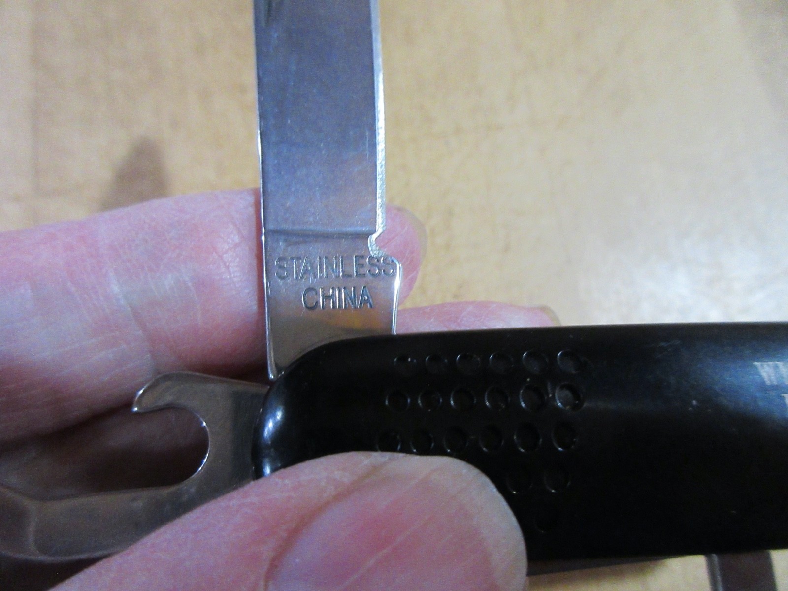 Folding multi tool Unbranded advertising Wickley Agency Hancock MI. (LKL)